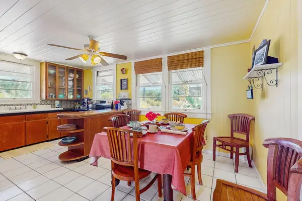 Sunlit Dining Room With Garden Views