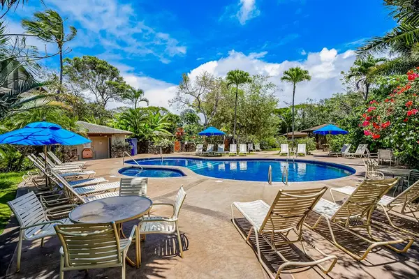Resort Pool Surrounded By Tropical Beauty
