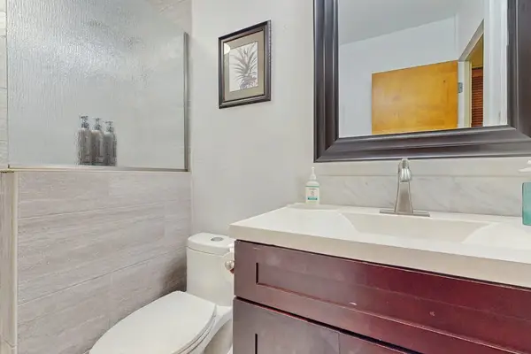 Clean Guest Bathroom Setup Packed With Fresh Linens