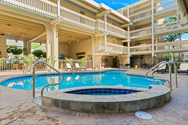 Unwind In The Hot Tub Under The Palm Trees