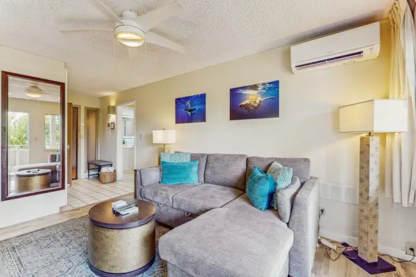 This lovely living room with a sleeper sofa for extra company.