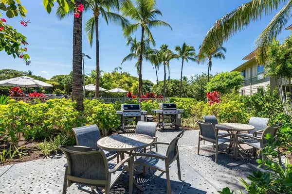 Outdoor patio overlooking the resort pool