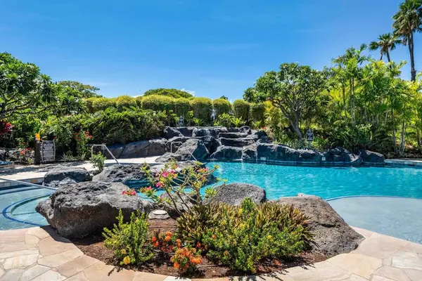 Tropical pool oasis with peaceful surroundings