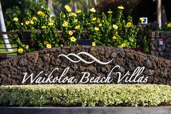 Beautiful resort entrance surrounded by lush gardens