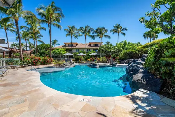 Resort pool nestled among tropical gardens