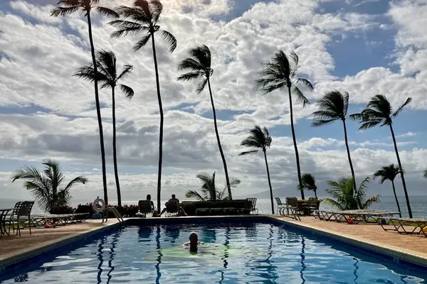 Resort Pool Glowing At Sunset