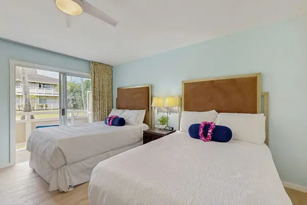 Spacious bedroom with two queen beds