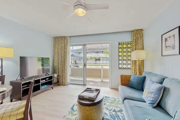 Comfortable living room with lanai access