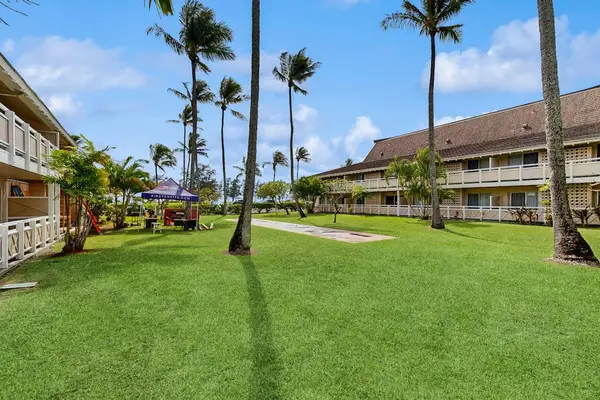 Spacious courtyard with tropical landscaping
