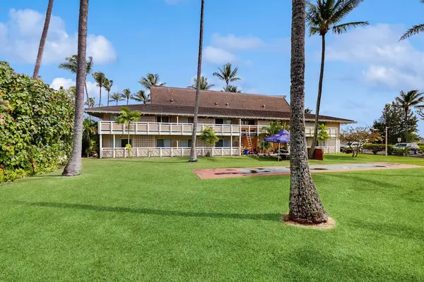 Expansive green lawn with resort views