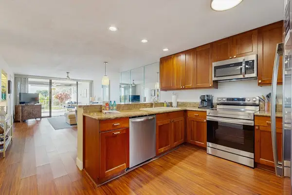 Sleek, modern kitchen setup with all the essential appliances you need for a comfortable stay