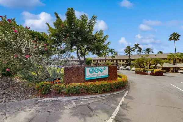 A welcoming entrance to the beautifully landscaped resort community