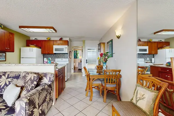 Open Kitchen And Living Area With Island Style