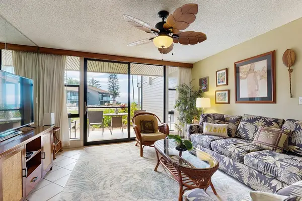 Relaxing Living Room With Lanai And Garden Views