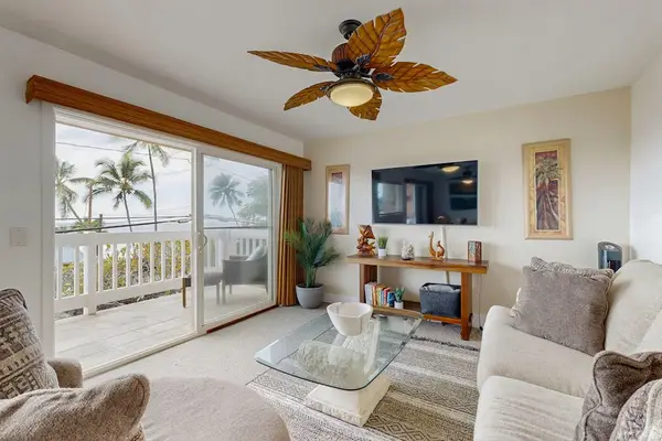 Living Room With Balcony Access