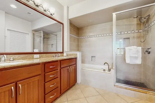 Primary bathroom with a walk-in shower