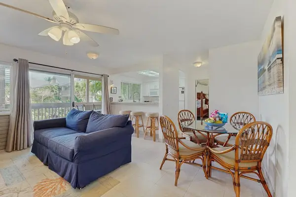 Living room with plenty of natural light from the lanai.