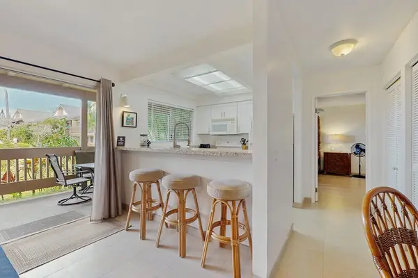 Three barstools for extra seating.