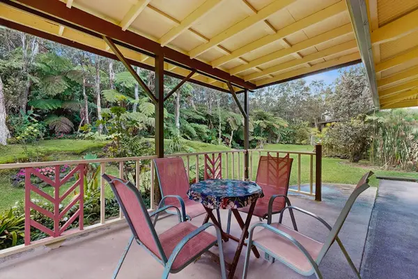 Covered Lanai Dining Table with Scenic Garden Views