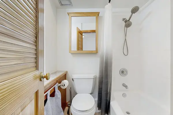 Refresh and unwind in this pleasant bathroom designed for everyday comfort.