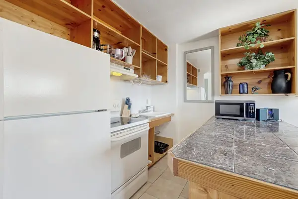 Make yourself at home with a kitchen and dining area designed for everyday comfort.
