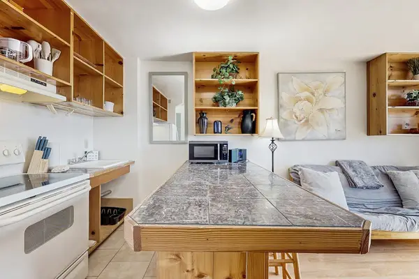 Cook, dine, and enjoy shared moments in this welcoming kitchen and dining area.