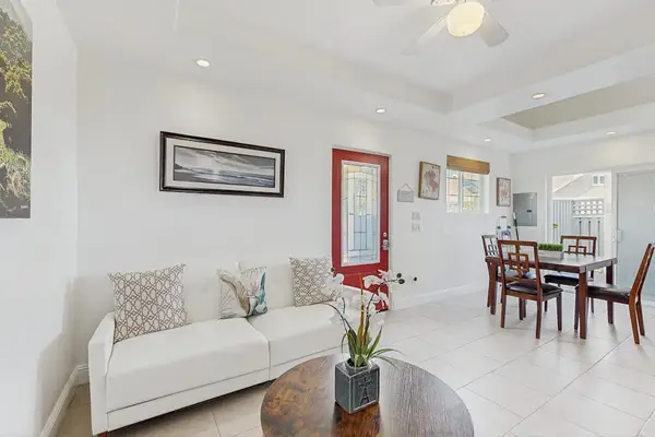 Living room with sofa bed and flat screen tv.
