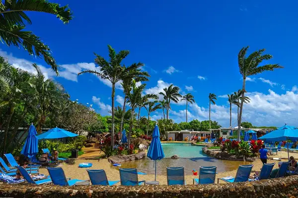 Lounge by the pool with cool island breezes