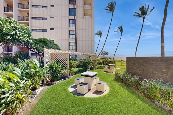Stroll through the grounds through Sugar Beach Resort and take in the tropical views.