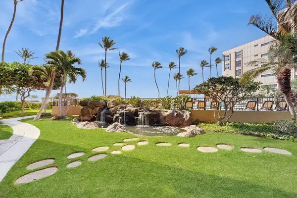 Stroll through the grounds through Sugar Beach Resort and take in the tropical views.