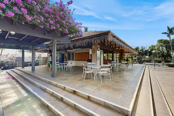 Relax on the spacious poolside patio