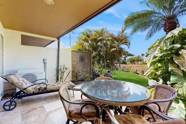 Lanai surrounded by tropical greenery