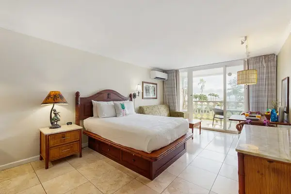 Wake Up to Tropical Views from Your Queen Bed