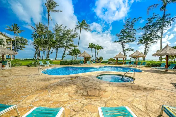 Resort Pool with Relaxing Hot Tub