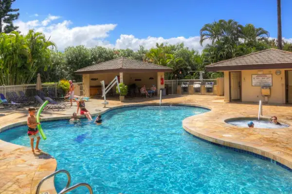 Relax poolside and enjoy the warm Hawaiian sunshine