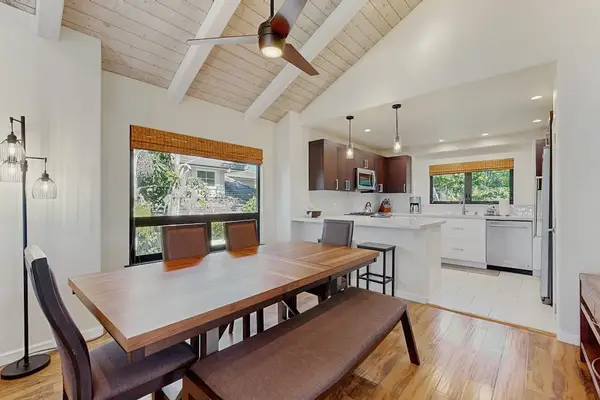 Gather Around The Spacious Dining Table