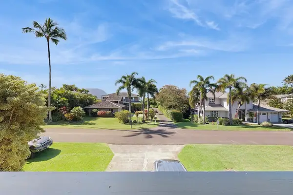 Expansive Lawn With Tropical Surroundings