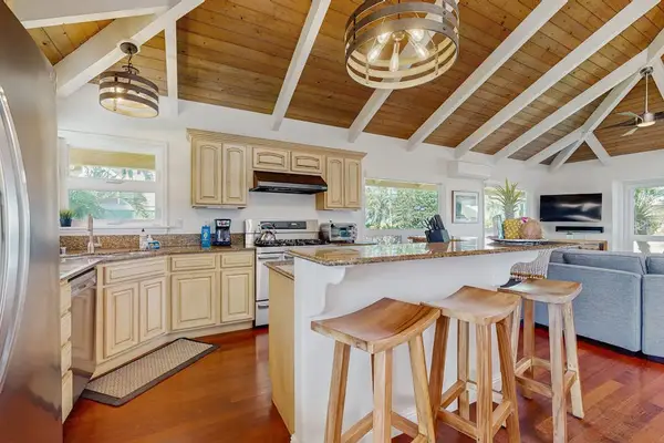 Bright, open floor plan with abundant natural light and extra seating—perfect for your sous chef or gathering with family and friends.