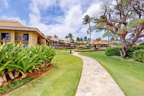 Charming Garden Walkway Through The Resort Grounds