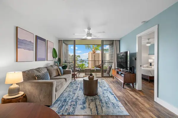Bright Coastal Living Room With Lanai Access
