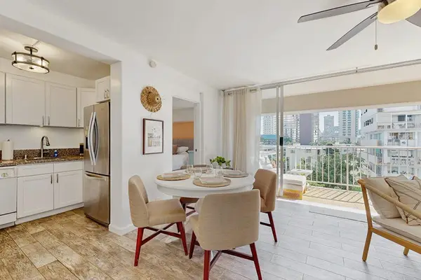 Enjoy convenient dining and kitchen spaces with easy access to your private balcony.