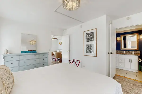 Enjoy peaceful nights and refreshed mornings in this comfortable queen bed.