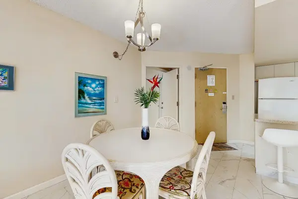 Bright dining space with charming island décor