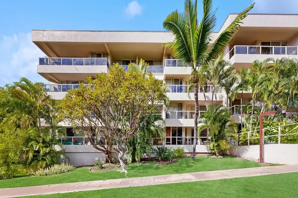 Inviting property exterior with island landscaping
