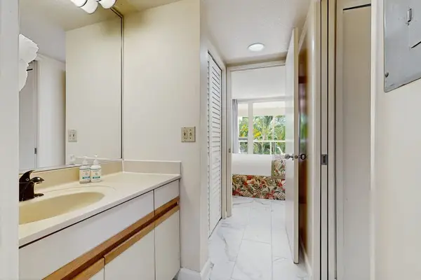 Bright bathroom vanity with convenient counter space