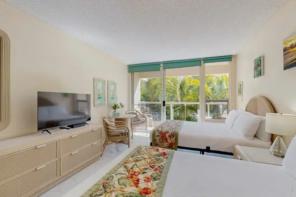 Comfortable living area with relaxing views of the greenery