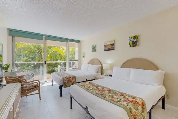 Bright Studio with comfortable seating and peaceful garden views