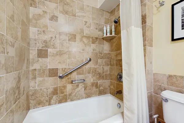 Beautiful Tiled Bathroom With Soaking Tub