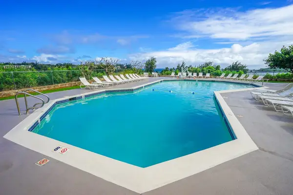 Expansive Pool Under Blue Skies