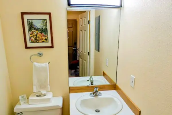 Convenient half bathroom for added comfort